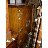Mid 20th Century figured walnut drinks cabinet with two doors above two drawers on carved cabriole