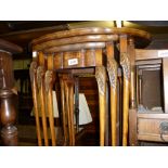 Nest of three reproduction walnut oval occasional tables,