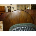 Victorian circular rosewood tilt top centre table raised on carved and turned column and tripod