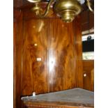 George III mahogany shell and line inlaid hanging corner cabinet