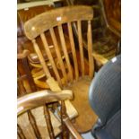 Early 20th Century stick back kitchen elbow chair on turned supports with stretchers