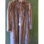 Ladies three quarter length dark mink coat