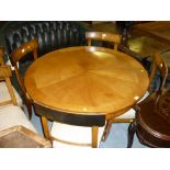 19th Century walnut and satin birch dining room suite in Biedermeier style comprising: circular