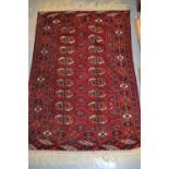 Pakistan rug of Bokhara design on a wine ground