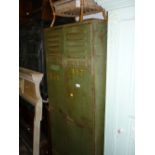 Green painted American steel 1940's lockers with stencilled yellow numbers (a/f)