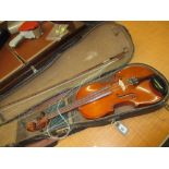 Violin with bow in a fitted case,