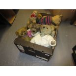 Box containing a collection of various vintage teddy bears