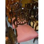 Pair of 20th Century mahogany open armchairs having oval carved and pierced back supports on square