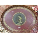 19th Century oval red toleware tray painted with a portrait of a seated lady