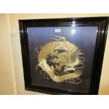 Chinese gold thread work dragon picture housed in an ebonised frame
