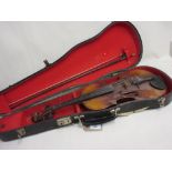 Student violin with an indistinctly signed bow,
