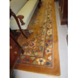 Chinese floral pattern woollen carpet on a gold ground