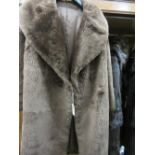 Ladies three quarter length brown fur coat together with two fur stoles and a fur hat