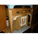 19th Century stripped pine washstand with a swing mirror above a drawer and cupboard door