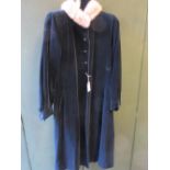 Ladies black velvet fur trimmed coat