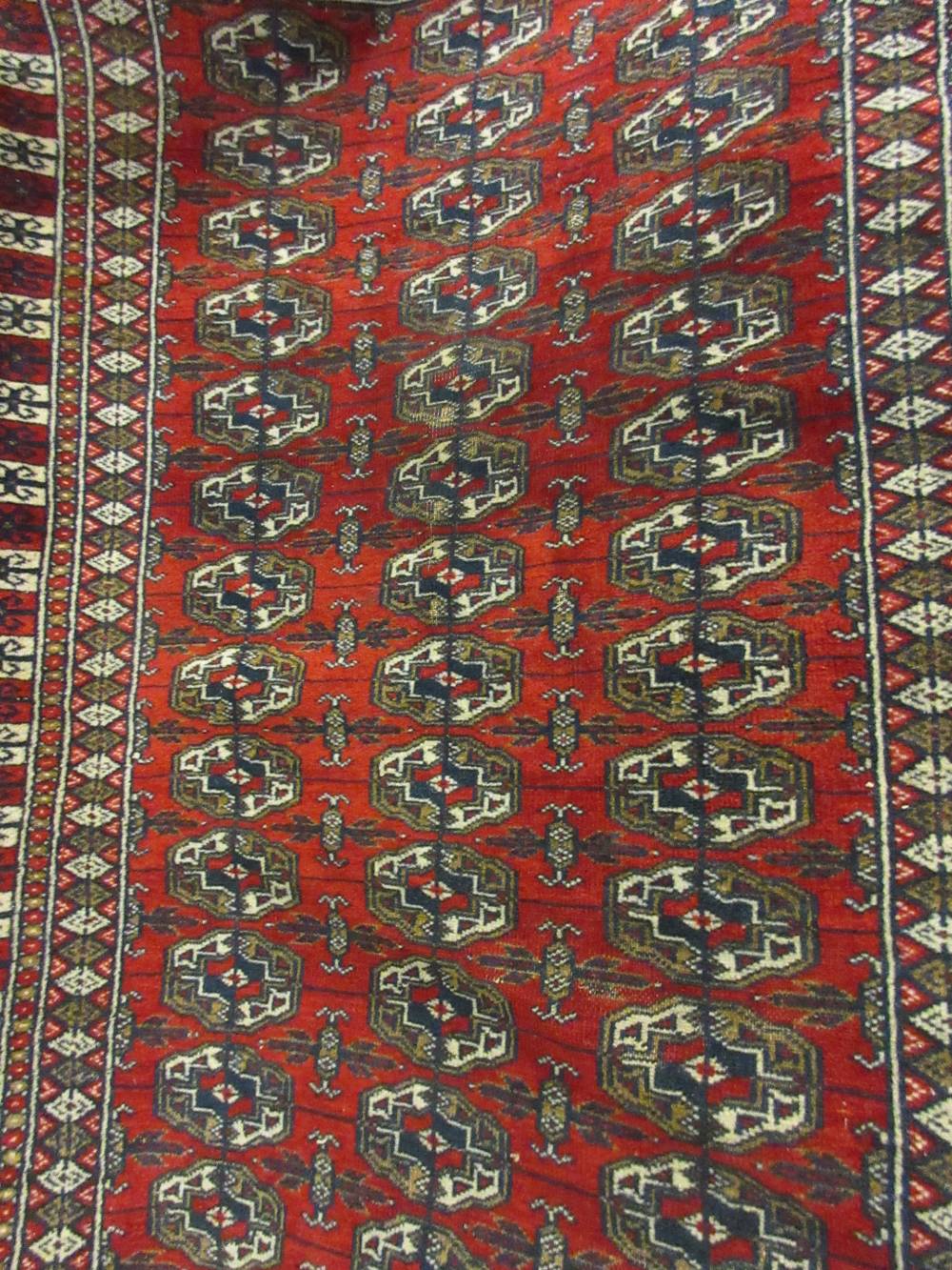 Three Pakistan Bokhara design rugs