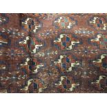 Turkoman bag face with four rows of four gols on a brown ground with border,