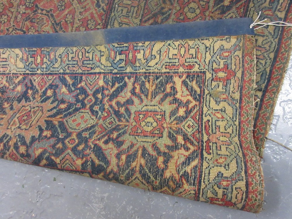 Large antique Feraghan rug having red and blue ground with all-over floral design and multiple - Image 4 of 4