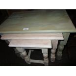 Nest of three rectangular pine occasional tables together with a rectangular pine coffee table