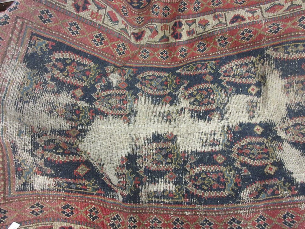 Antique Hamadan runner with blue and rust ground and multiple borders, (heavily worn),