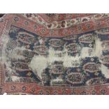 Antique Hamadan runner with blue and rust ground and multiple borders, (heavily worn),