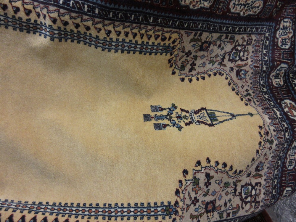 Pakistan Persian pattern prayer rug with multiple borders on a beige ground,