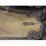 Pakistan Persian pattern prayer rug with multiple borders on a beige ground,