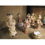 Group of six various Japanese Satsuma figures together with a miniature circular box and cover