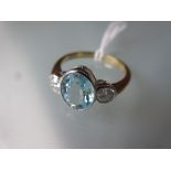 18ct Yellow gold three stone aquamarine and diamond ring