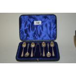 Cased set of six London silver coffee spoons together with a pair of Sheffield silver sugar tongs