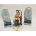 Pair of Art Deco vases in the form of ships and a Capo di Monte figure of a man smoking