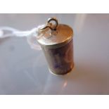 9ct Gold mounted charm containing a ten shilling note