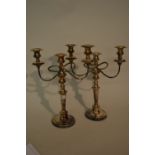 Pair of silver plated on copper three branch candelabra