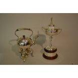 Silver plated spirit kettle on stand with burner and a silver plated two handled golfing trophy cup