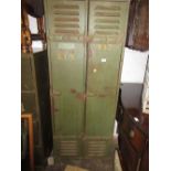 Green painted American steel 1940's lockers with stencilled yellow numbers (a/f)