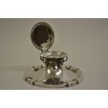 Omar Ramsden circular hand beaten silver capstan inkwell, London 1919, 5.