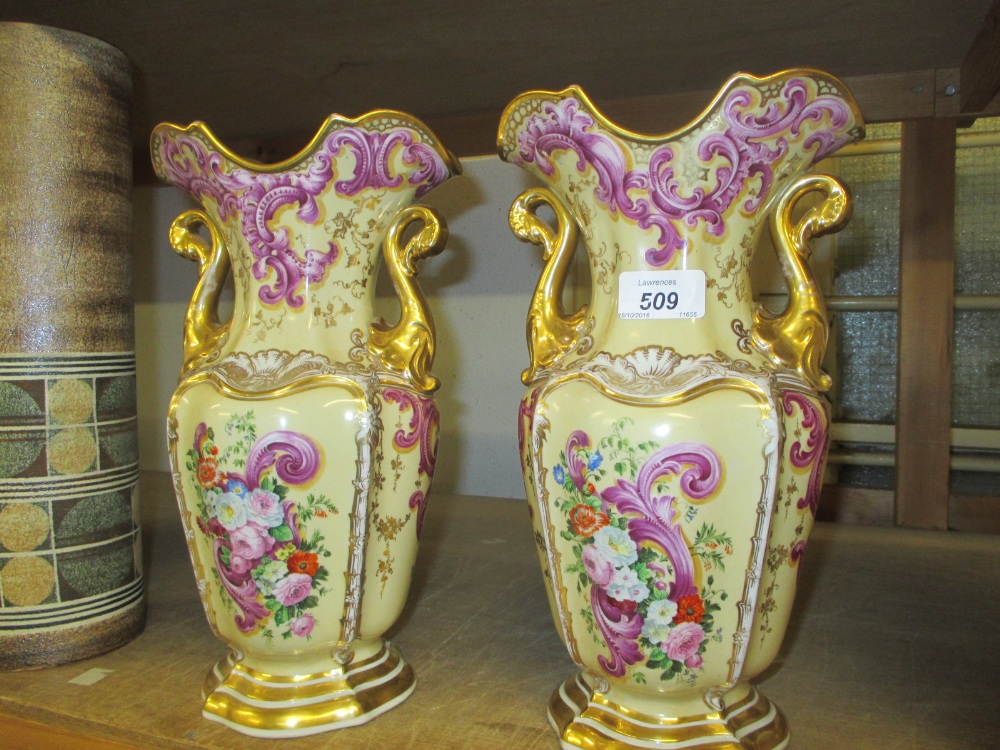 Pair of large 19th Century Paris porcelain vases decorated with flowers on a beige ground