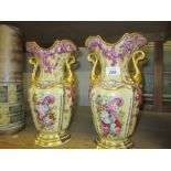 Pair of large 19th Century Paris porcelain vases decorated with flowers on a beige ground