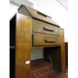 1930's Oak bureau with integral side bookshelves together with an oval mahogany wall mirror