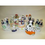 Eight various 19th Century Staffordshire figures including a zebra spill vase (a/f)