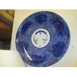 Late 19th / early 20th Century Japanese circular blue and white wall plate together with an Eastern