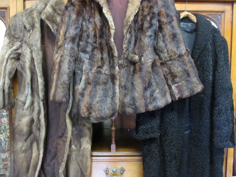 Collection of various fur coats, jackets,