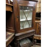 18th Century oak corner cabinet mounted on a later stand (utilising early timbers)