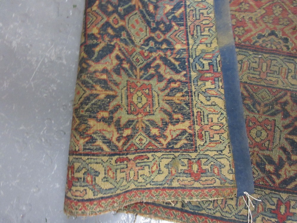 Large antique Feraghan rug having red and blue ground with all-over floral design and multiple - Image 3 of 4