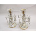 Pair of Continental porcelain candlesticks with glass sconces and drops