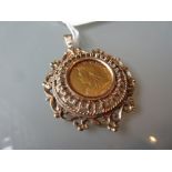 1894 Sovereign housed in a heavy yellow metal pendant mount