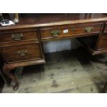 Reproduction cherry wood five drawer kneehole desk on cabriole supports (leg damage) and a similar