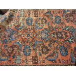 Hamadan rug with all-over Herati design on a rose ground with borders (worn),