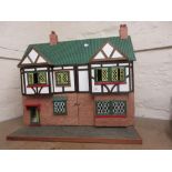 Modern hand crafted two bay dolls house together with a large quantity of modern dolls house