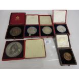 Two Edward VII Coronation medals in original boxes together with another in an associated box,